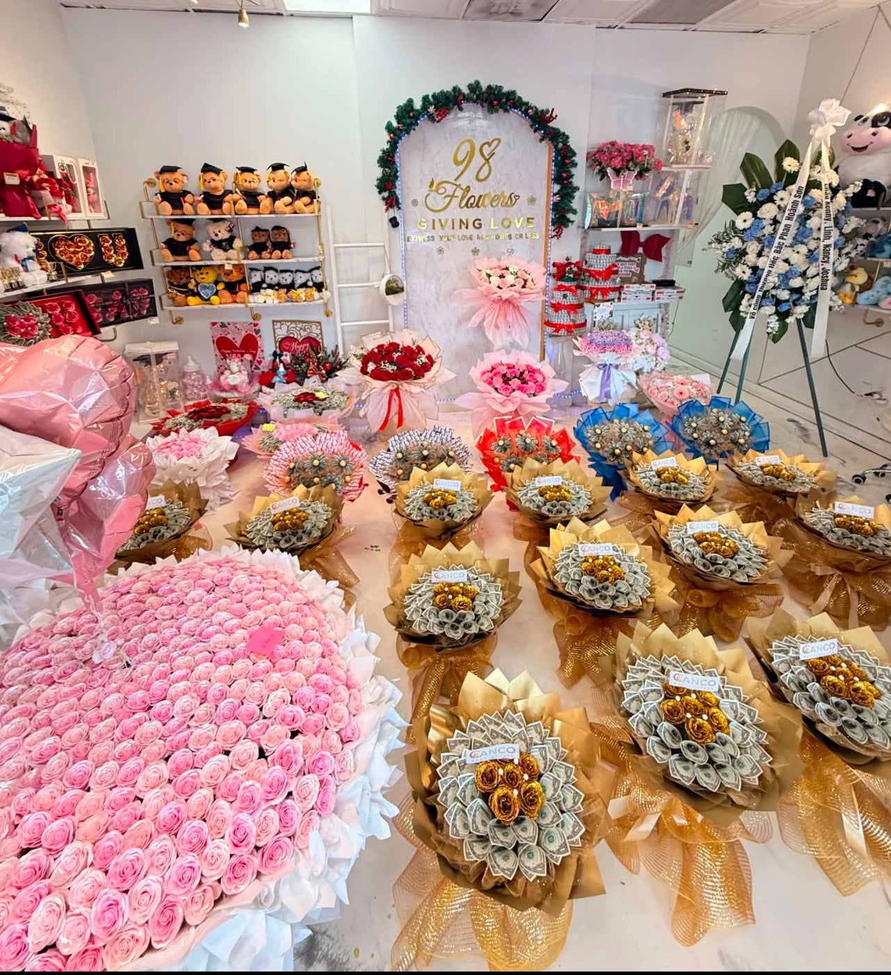 Golden money bouquet event display inside 98 Flowers