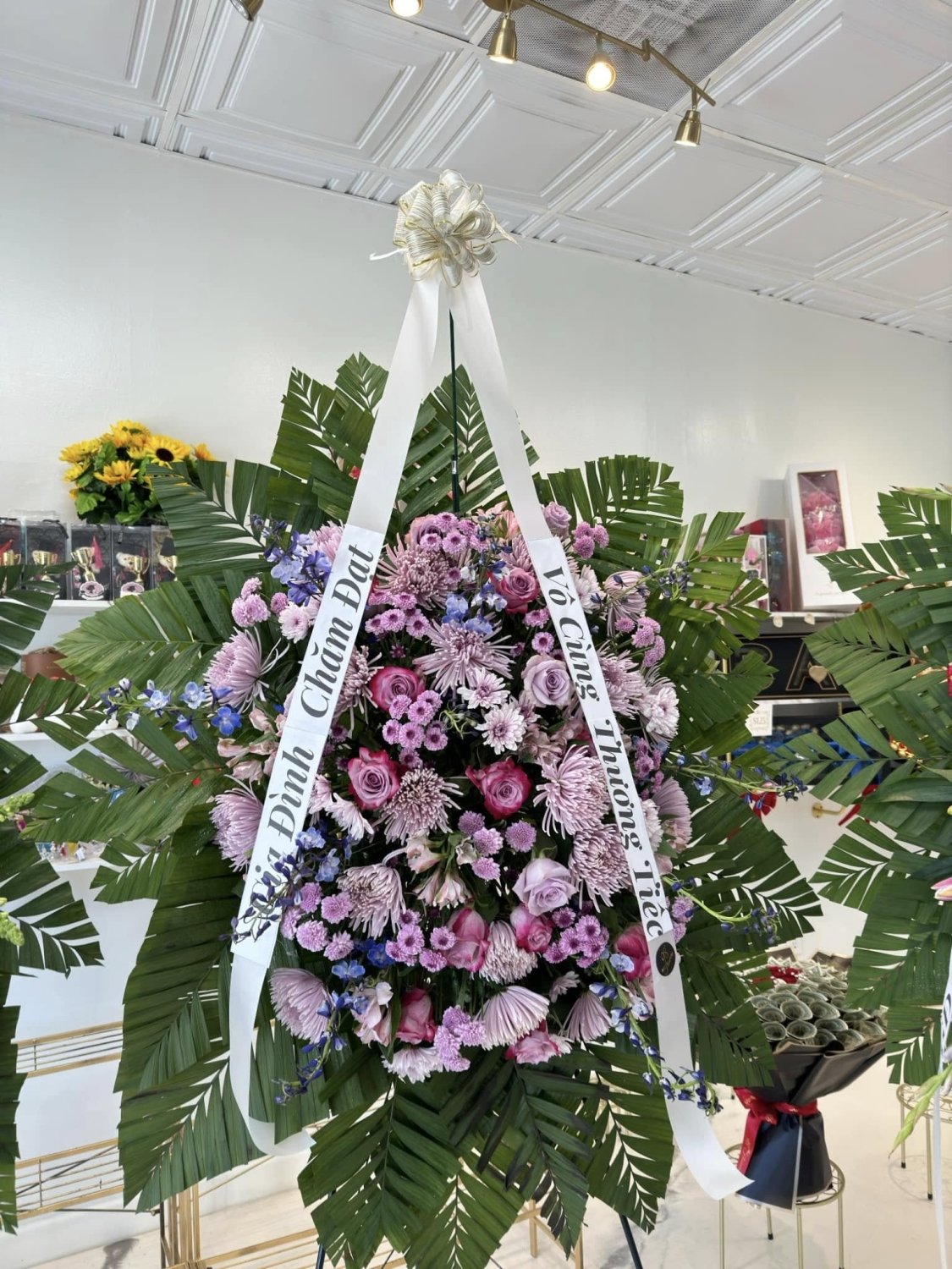 Lavender Garden Sympathy Standing Spray - 98 FLOWERS