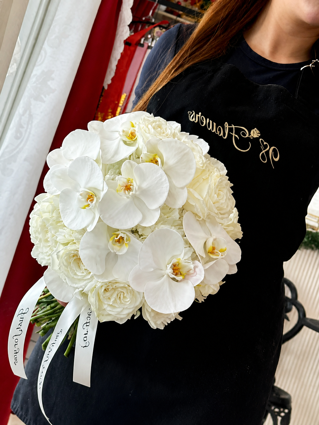 White orchid, rose and hydrangea round bridal bouquet