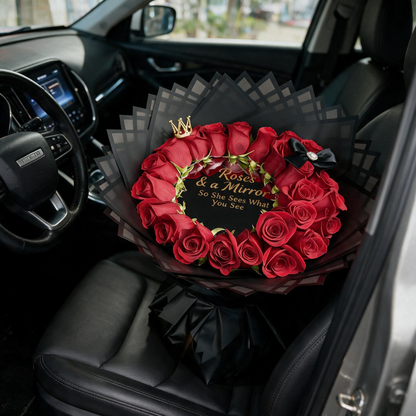 24 red roses and personalized mirror bouquet displayed on a car seat