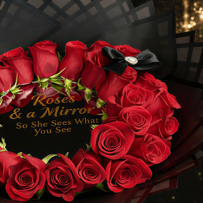 Close-up of red roses, black bow, and gold lettering on the keepsake mirror