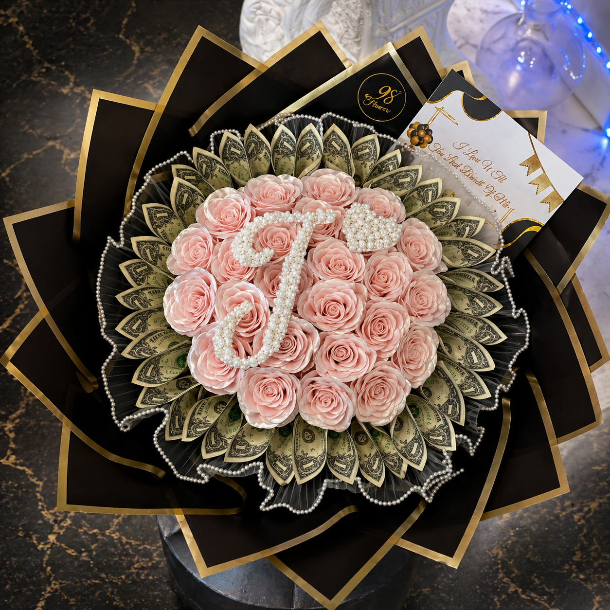Luxury money bouquet with blush roses, pearl initial and black-gold wrapping
