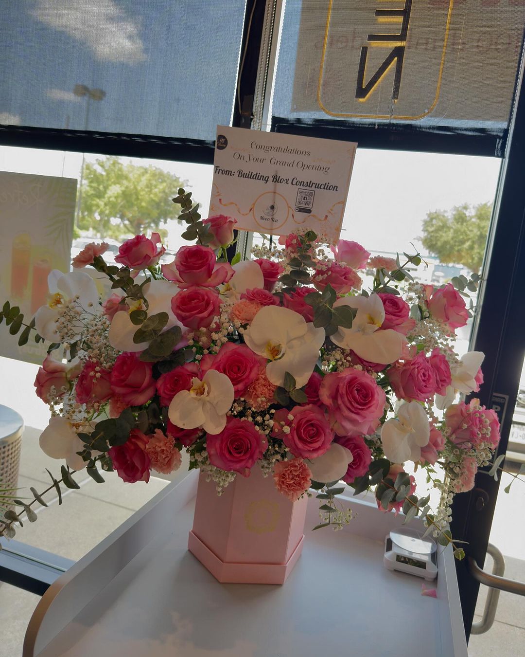 Blushing Orchid Grand Opening Arrangement image 5