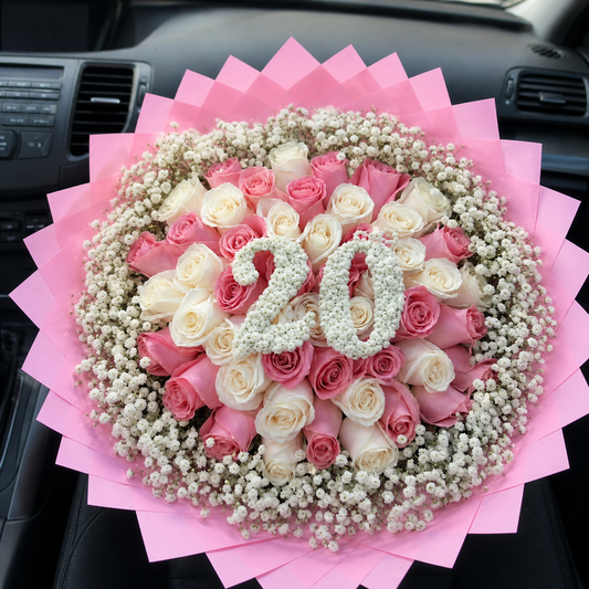 Jumbo pink and ivory rose bouquet with baby’s breath number 20 design