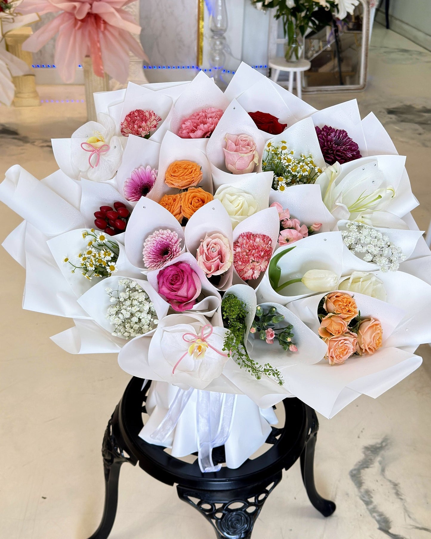 Extra-large Bouquet of Bouquets displayed upright with pearl-white wrapping