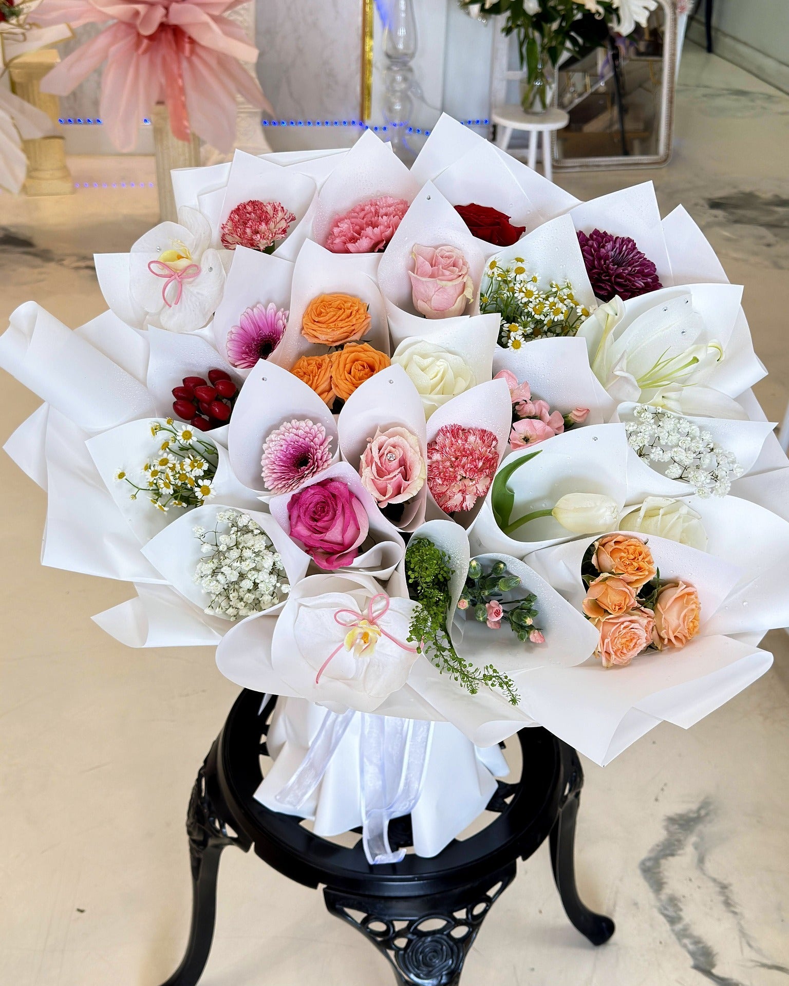 Extra-large Bouquet of Bouquets displayed upright with pearl-white wrapping