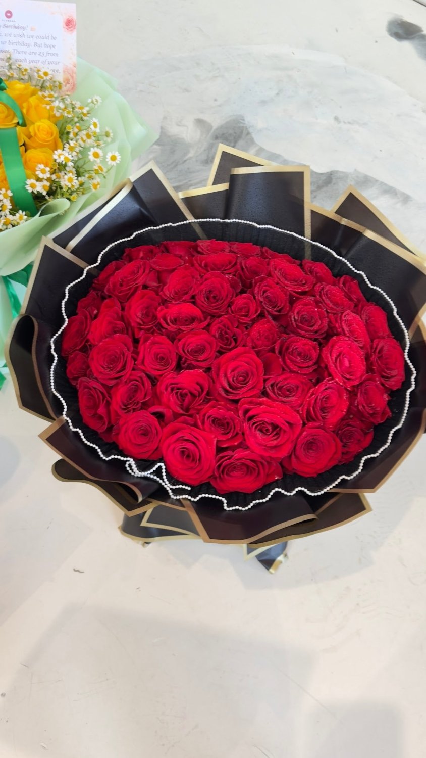 Classic Round Red Rose Bouquet with Black Wrapping - 98 FLOWERS