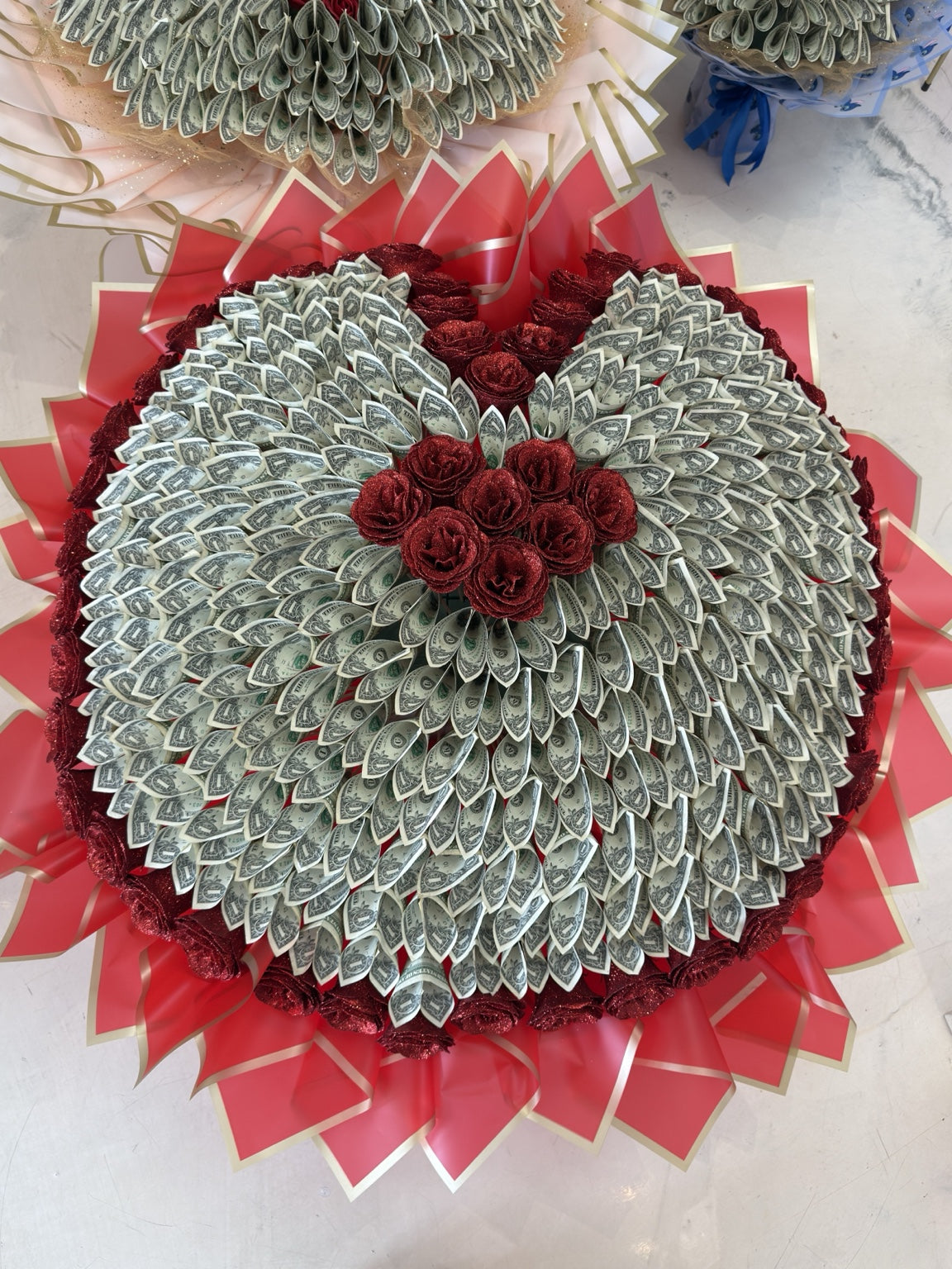 Red giant heart-shaped money bouquet with red glitter roses and 200 one-dollar bills