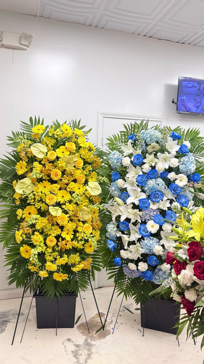 Yellow and blue-white sympathy standing spray color options
