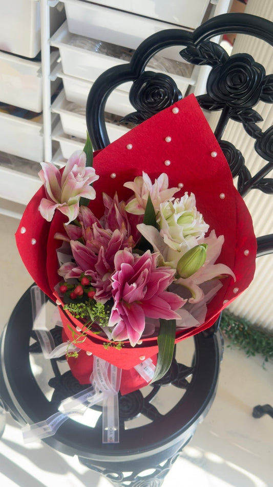 Ruby Wrap Lily Bouquet - 98 FLOWERS