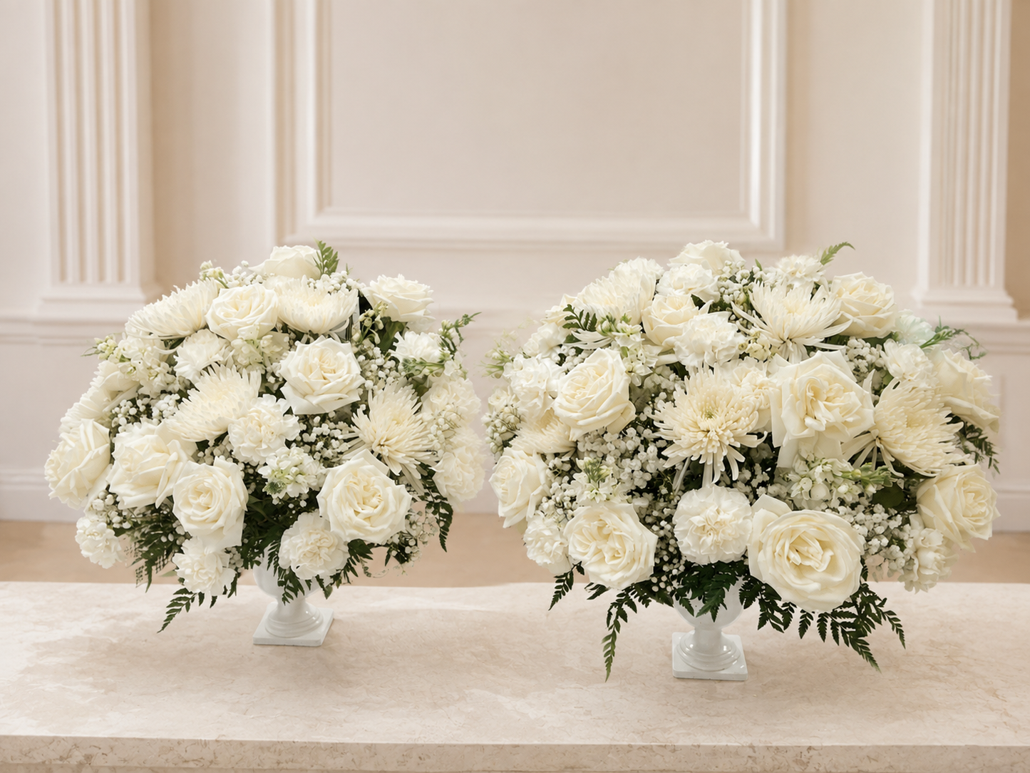 Alternate view of two white funeral flower vases on a clean ivory background