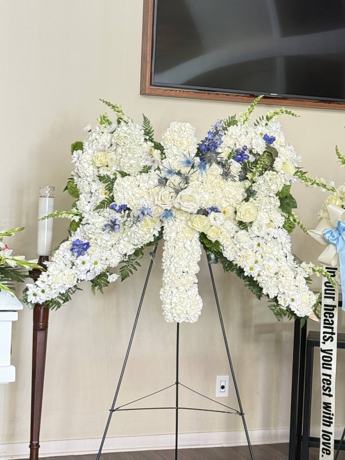 White & Blue Angel Wing Memorial Standing Spray - 98 FLOWERS