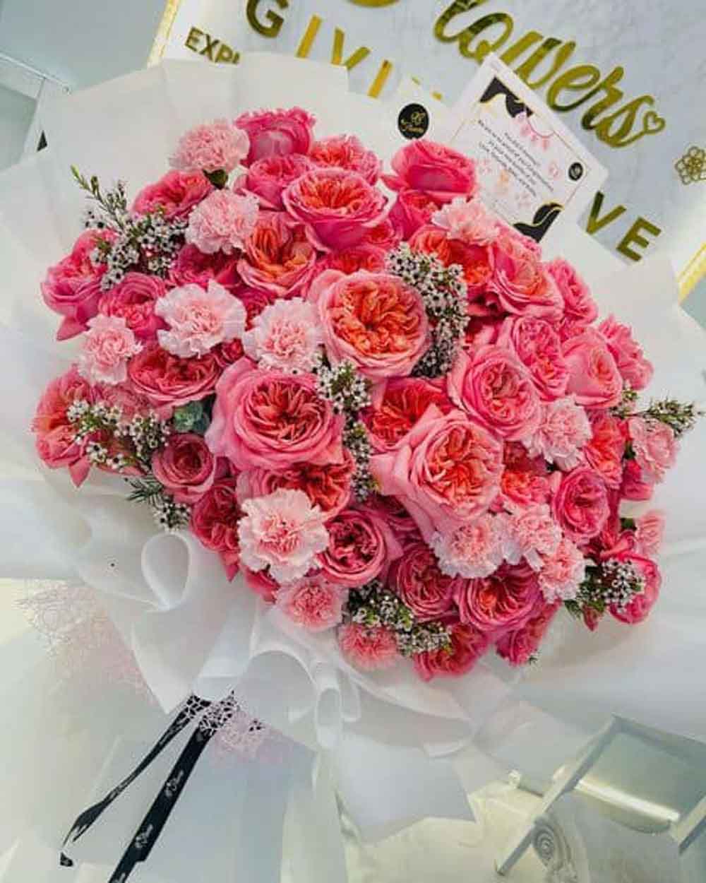 Bouquet Of Hot Pink Roses is suitable for wedding anniversary flowers