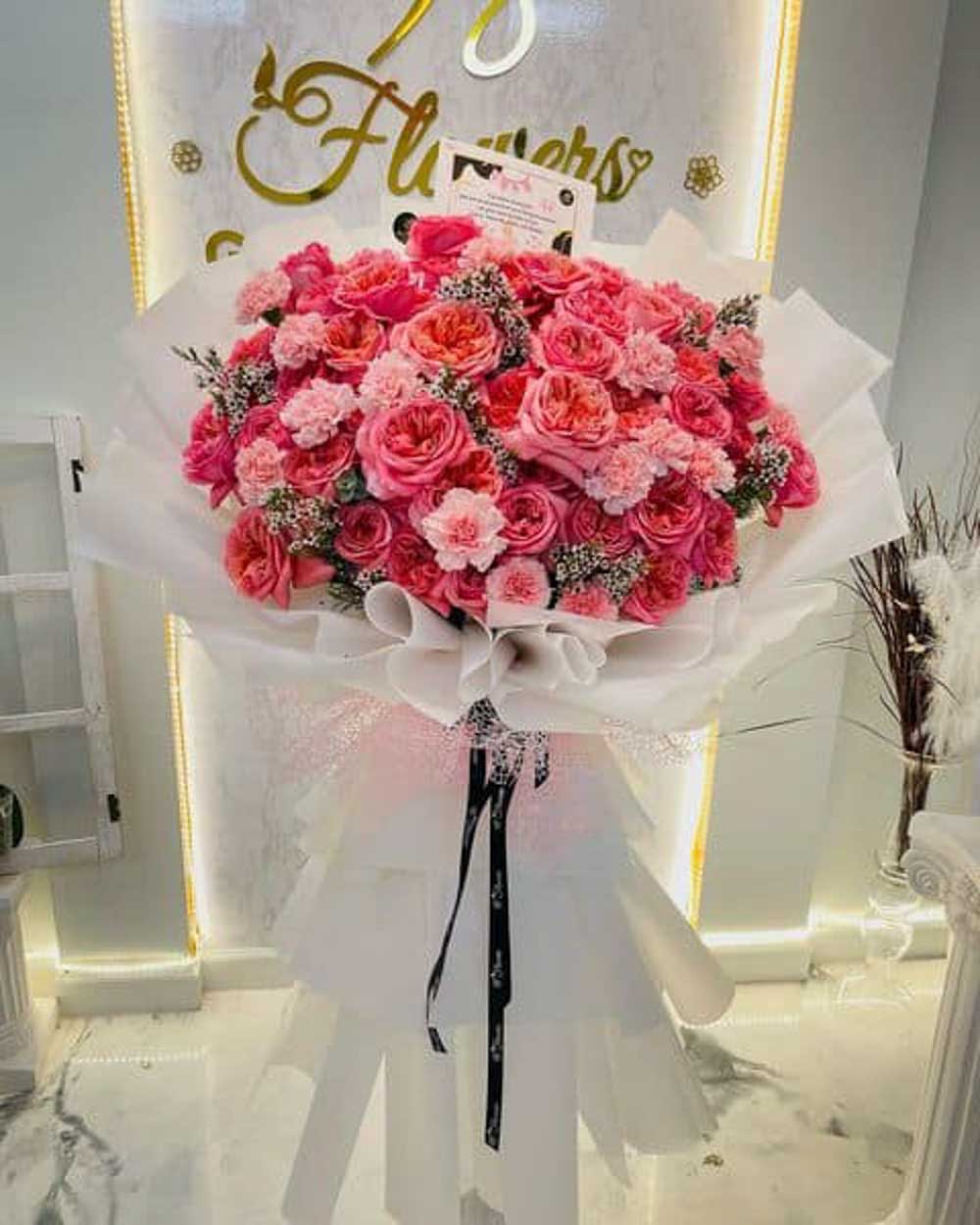 Bouquet Of Hot Pink Roses is suitable for wedding anniversary flowers