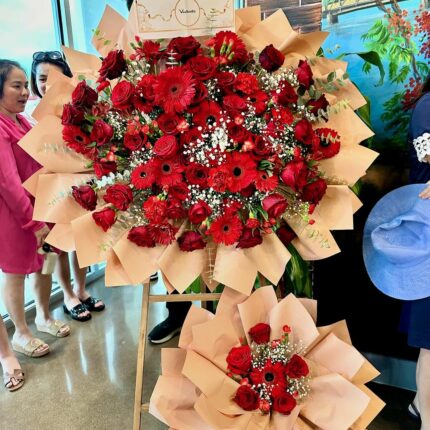 Crimson Celebration Grand Opening Standee mixed flower bouquet, red roses 