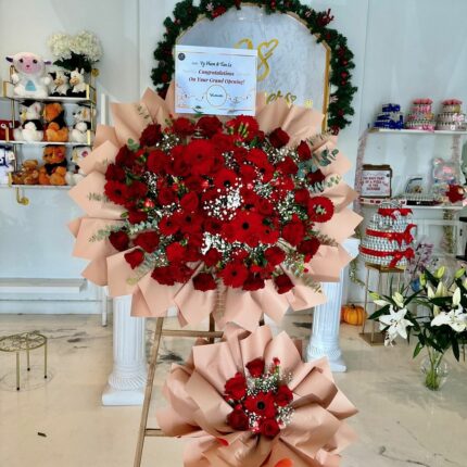 Crimson Celebration Grand Opening Standee mixed flower bouquet, red roses 