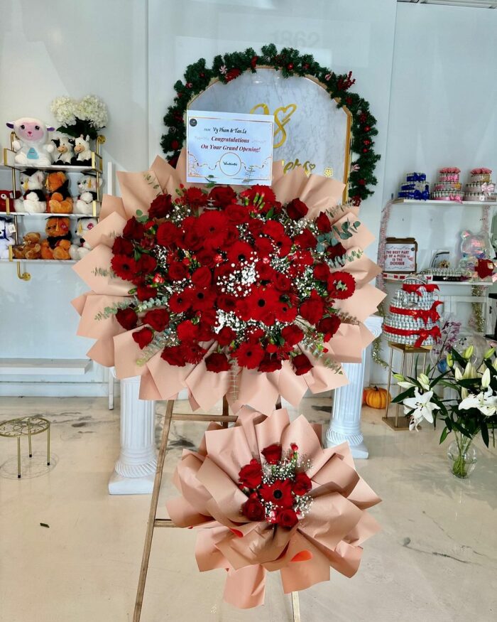 Crimson Celebration Grand Opening Standee mixed flower bouquet, red roses 