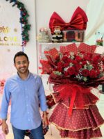 Happiness blooms where flowers do 🌹✨ Another happy customer with our signature red rose grand b