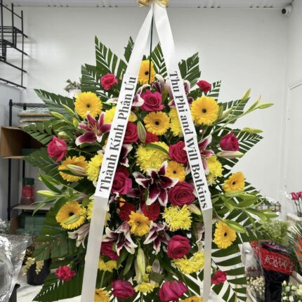 Bright Yellow & Red Sympathy Standing Spray – Celebration of Life Flowers Houston  